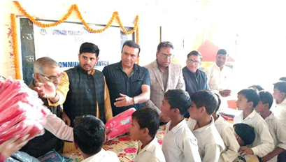 Report on Sweater Distribution at Adarsh Vidya Mandir  Village Bhartana Anola, Bareilly - Image 1